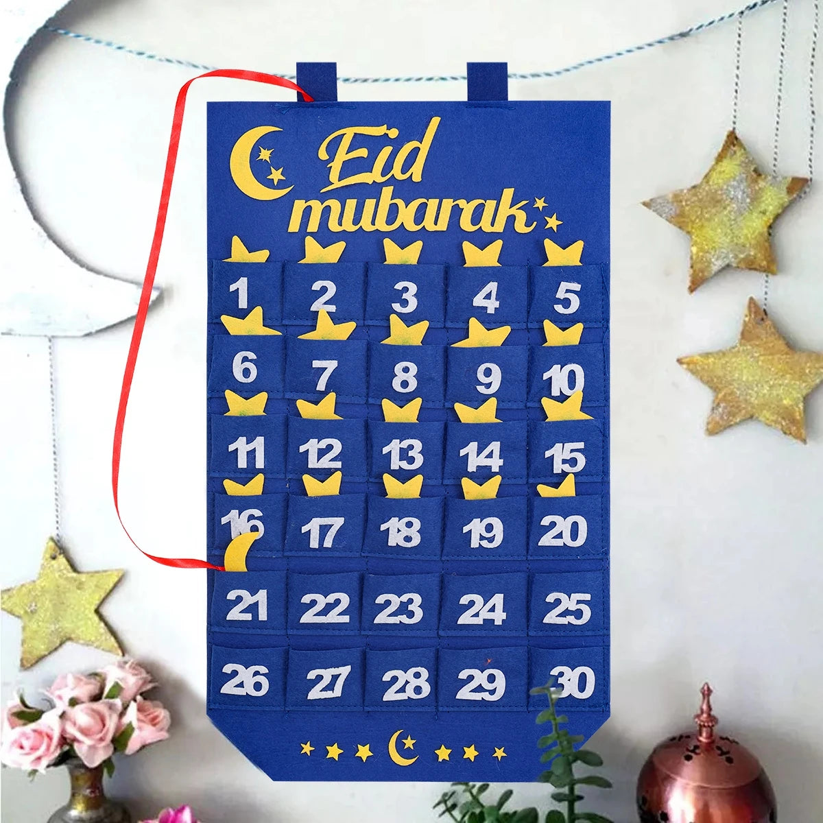 Eid mubarak countdown calendar with blue and yellow design on a white background