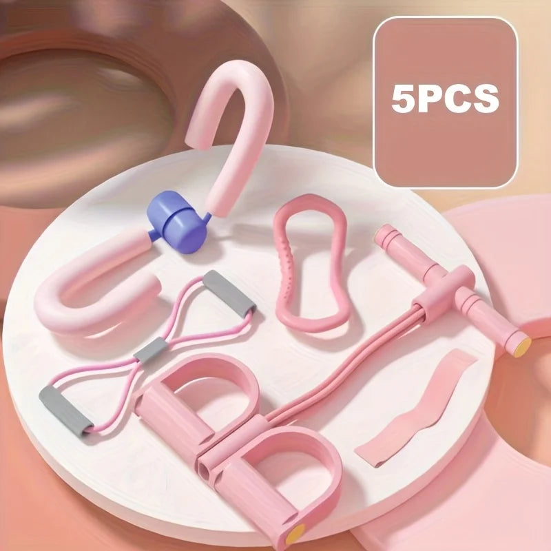 Set of pink resistance bands with handles on a white plate, labeled '5PCS'.