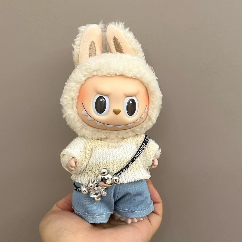 Toy figure of a character wearing a fluffy bunny costume with denim shorts, held against a plain background.